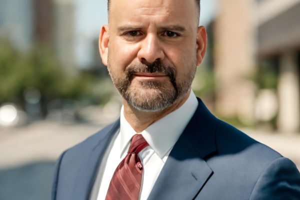 Hiring a criminal defense attorney in Miami during a confidential legal consultation.
